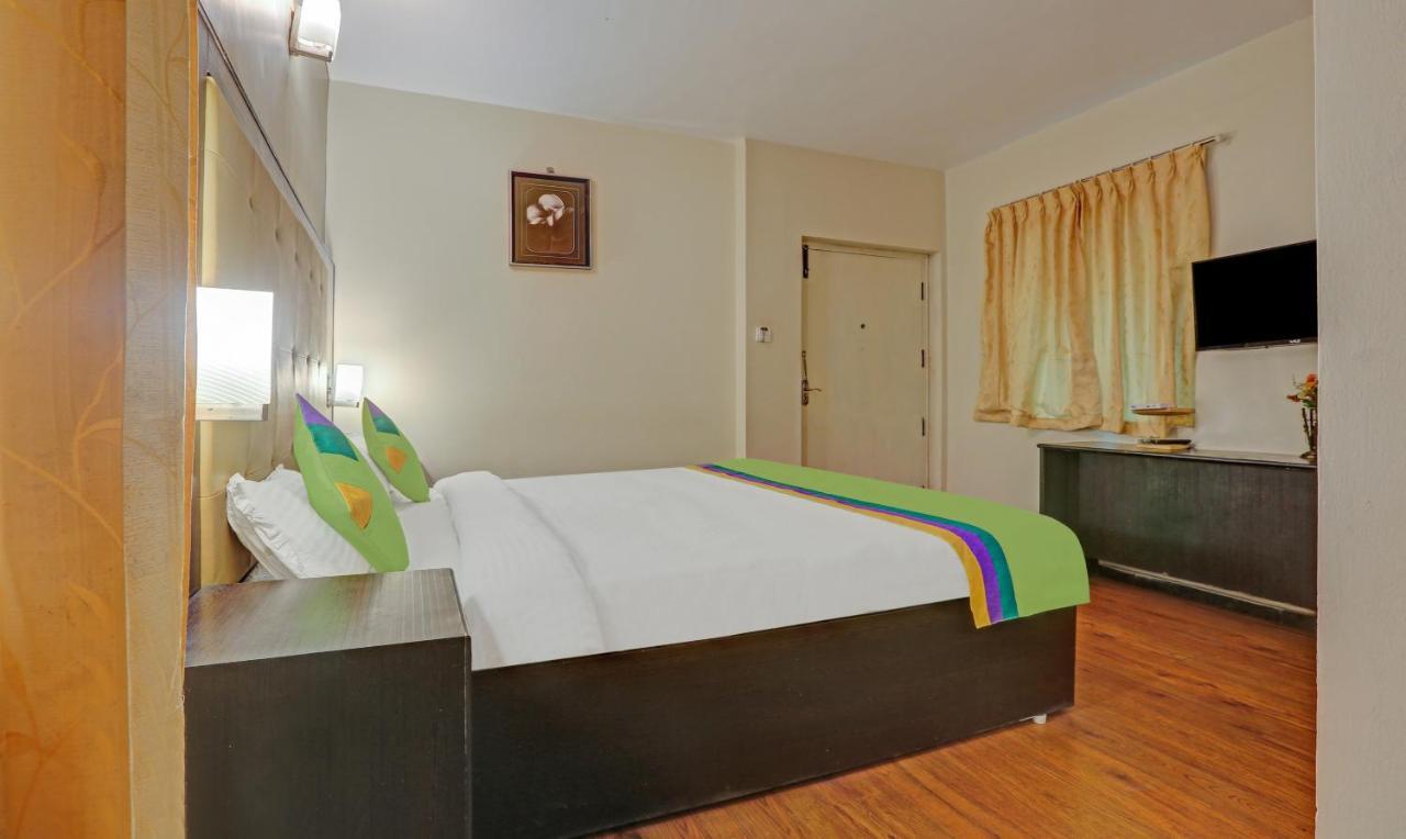 Resort Treebo Trend Whispering Meadows Fingerpost