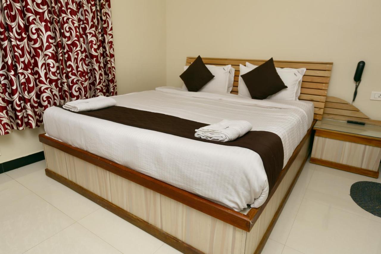 Hotel Al Woodlands Residency